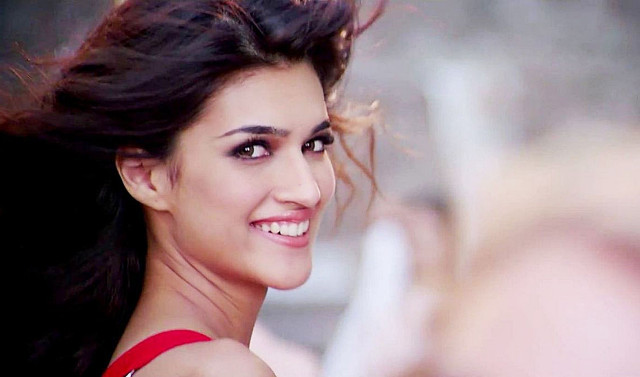 Woman smiling red top dress free wallpaper - medium preview image