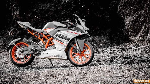 Motorcycle dirtroad rockwall tree tiltshift free wallpaper - medium preview image