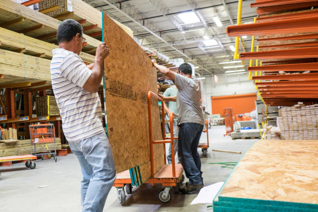 Men working wood warehouse pallets free wallpaper - medium preview image