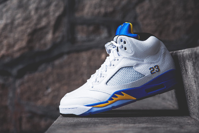 White blue sneakers ledge rock free wallpaper - medium preview image
