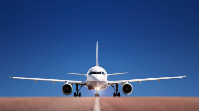 Jetliner flying blue sky runway #6 free wallpaper - medium preview image