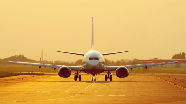 Jetliner airport runway sunset dawn #2 free wallpaper - medium preview image