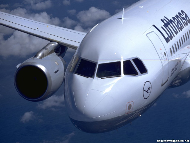 Large jetliner cloudy blue sky free wallpaper - medium preview image