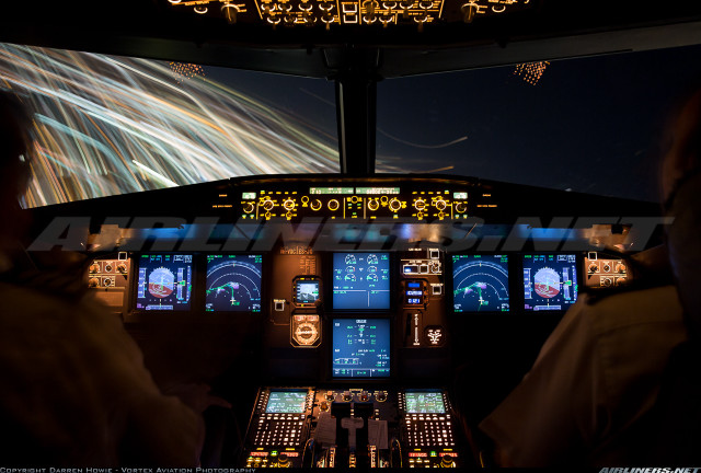 Cockpit nighttime screens lights view free wallpaper - medium preview image