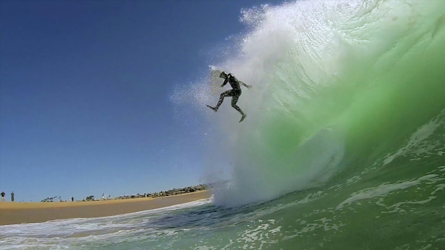 Surfing man ocean sunny day free wallpaper - medium preview image