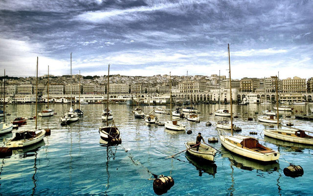 Harbor boats cloudy sky buildings free wallpaper - medium preview image