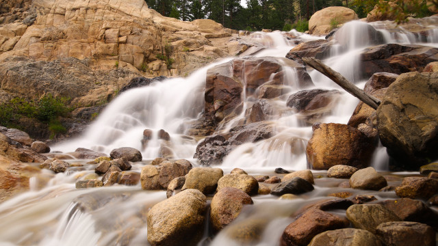 Waterfall rocks fallen tree branch free wallpaper - medium preview image