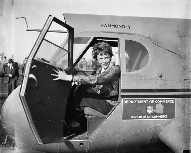 Woman plane hand smiling camera free wallpaper - medium preview image