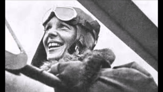 Woman pilot helmet smiling cockpit free wallpaper - medium preview image