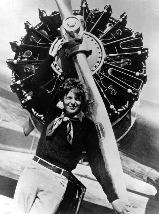Woman holding propeller plane air free wallpaper - medium preview image