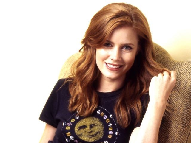 Woman smiling couch tshirt happy free wallpaper - medium preview image