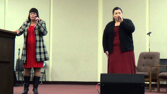 Woman standing podium microphone another free wallpaper - medium preview image