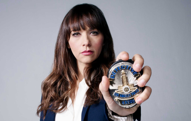 Woman holding clock serious look free wallpaper - medium preview image