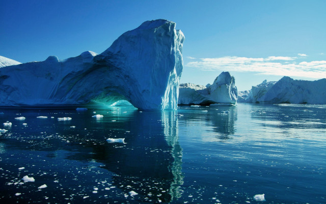 Iceberg floating ocean ice chunks free wallpaper - medium preview image