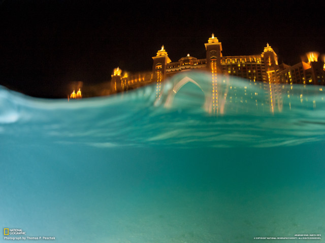 Large building water night time free wallpaper - medium preview image