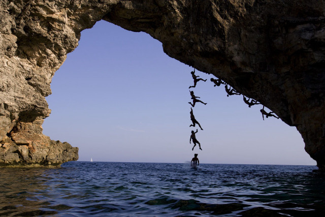 People rock formation ocean boat free wallpaper - medium preview image