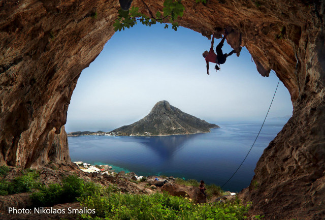 Man climbing mountain rope water free wallpaper - medium preview image
