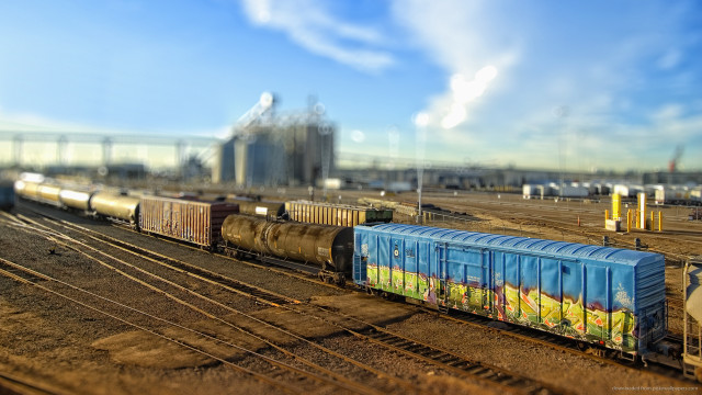 Train city tracks sky building free wallpaper - medium preview image