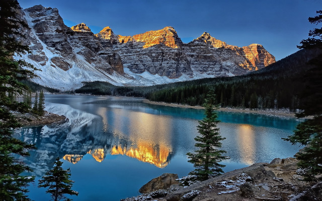 Mountain lake trees rocks foreground free wallpaper - medium preview image