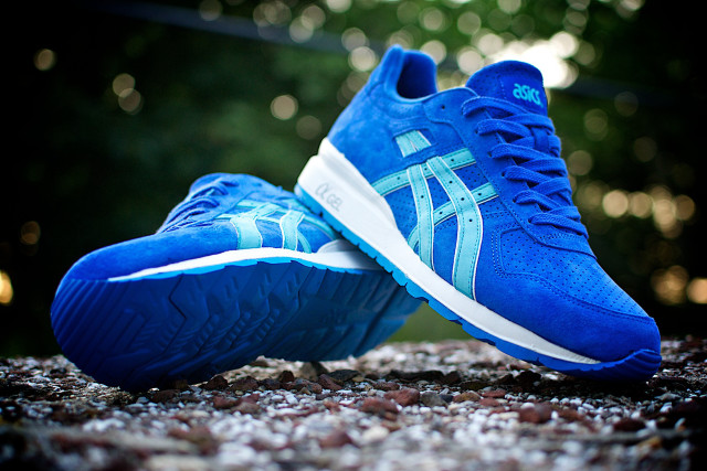 Blue sneakers rock ground trees free wallpaper - medium preview image
