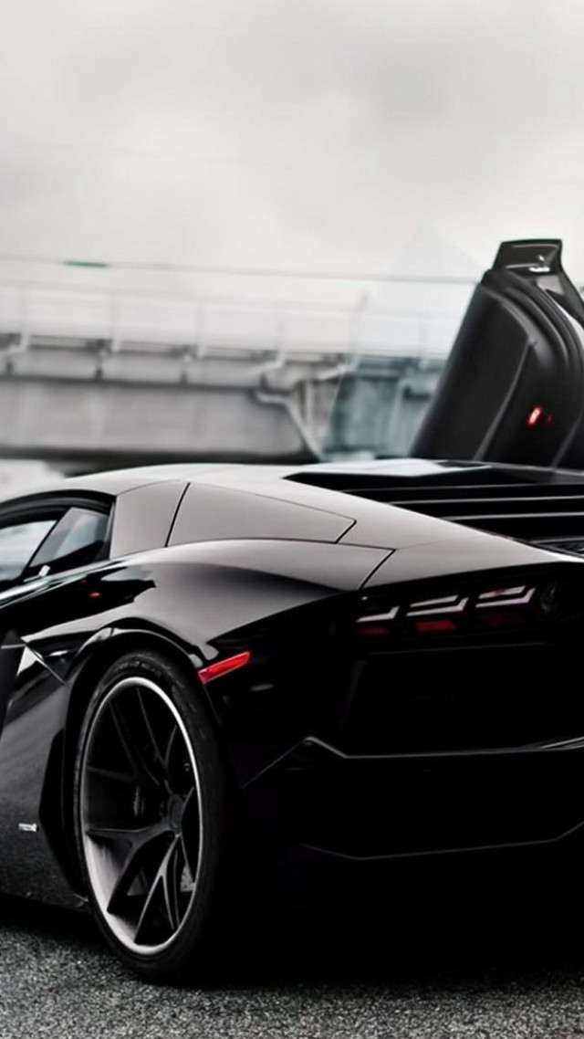 Black sports car parked road free wallpaper - medium preview image