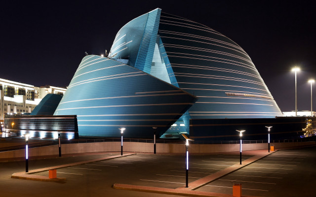 Large building curved roof nighttime #2 free wallpaper - medium preview image
