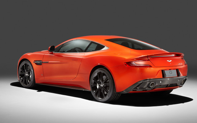 Bright orange sports car studio free wallpaper - medium preview image