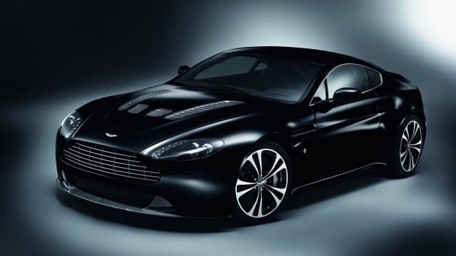 Black sports car spotlight photorealism free wallpaper - medium preview image