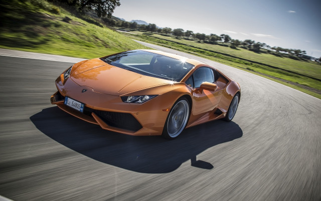 Orange sports car daytime road free wallpaper - medium preview image