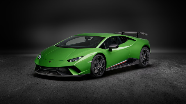 Green sports car dark room free wallpaper - medium preview image