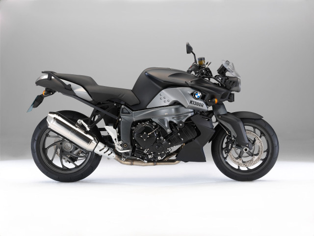 Black motorcycle parked white gray #2 free wallpaper - medium preview image