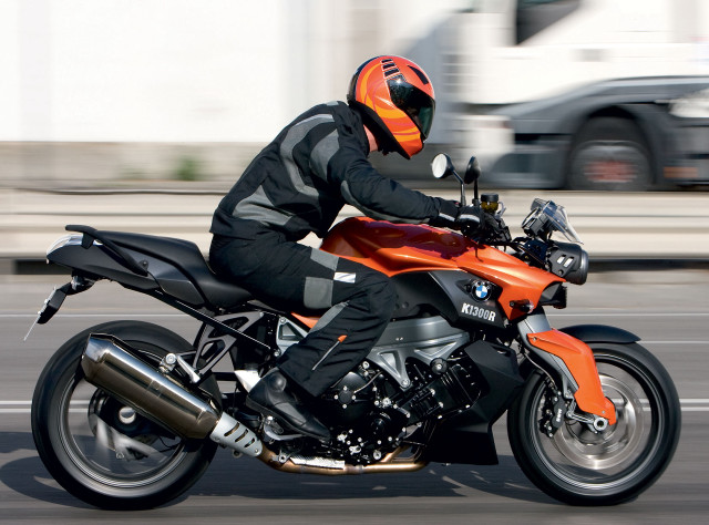 Man riding motorcycle street car free wallpaper - medium preview image