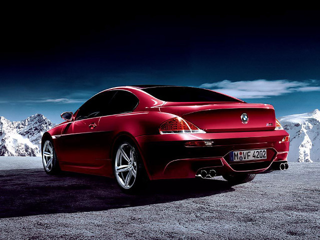 Red car parking lot mountains free wallpaper - medium preview image