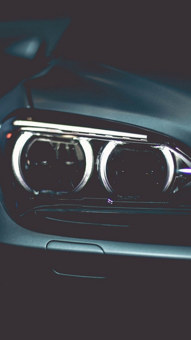 Car headlights closeup dark background free wallpaper - medium preview image