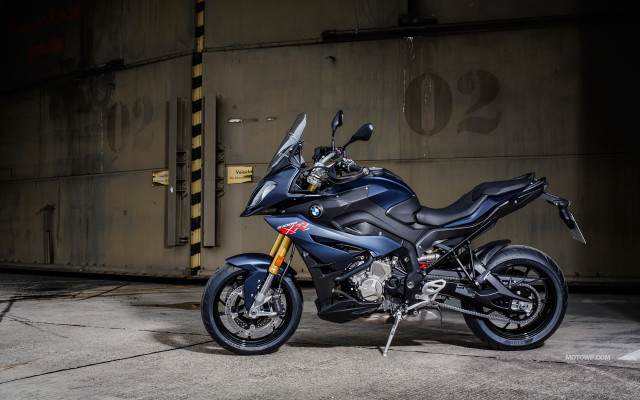 Motorcycle parked building sign no free wallpaper - medium preview image