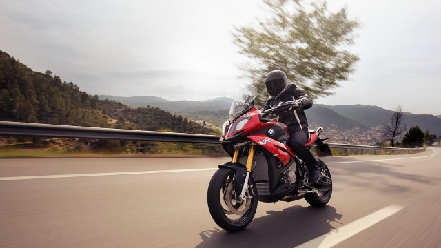 Motorcycle ride forest mountains background free wallpaper - medium preview image