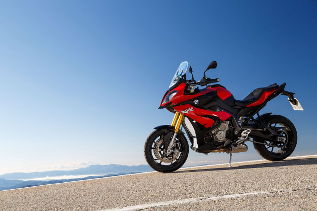 Red motorcycle mountains blue sky free wallpaper - medium preview image