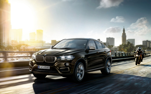 Black bmw suv city street free wallpaper - medium preview image