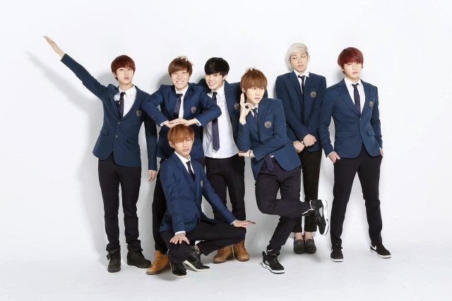 Young men suits posing camera free wallpaper - medium preview image