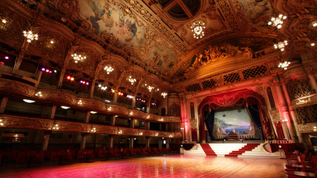 Auditorium stage chandelier performance red free wallpaper - medium preview image
