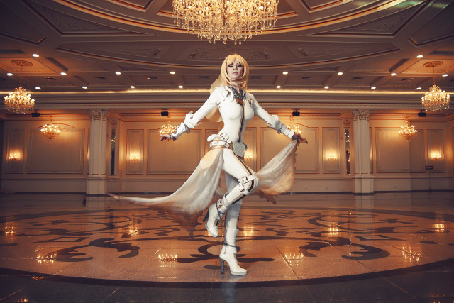 Woman white suit chandelier room free wallpaper - medium preview image