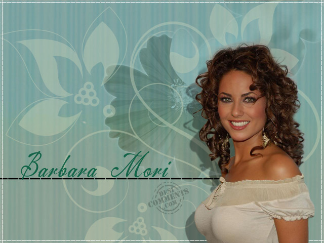 Curly haired woman smiling blue free wallpaper - medium preview image