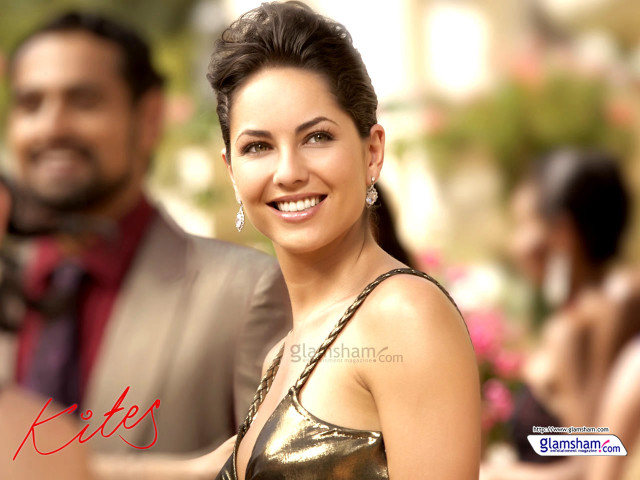 Woman gold dress smiling man free wallpaper - medium preview image