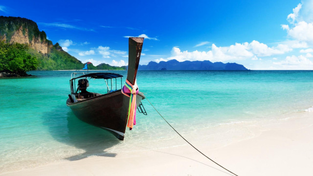 Boat pole beach water mountains free wallpaper - medium preview image