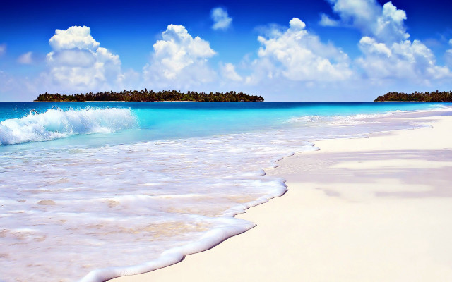 Beach wave island trees distance free wallpaper - medium preview image