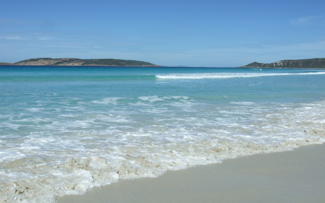Beach wave hill blue sky free wallpaper - medium preview image