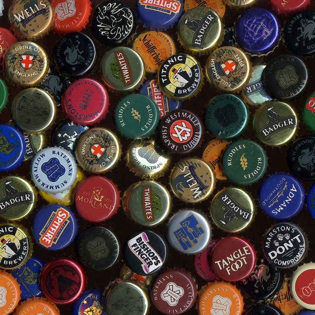 Colorful bottle caps black background free wallpaper - medium preview image