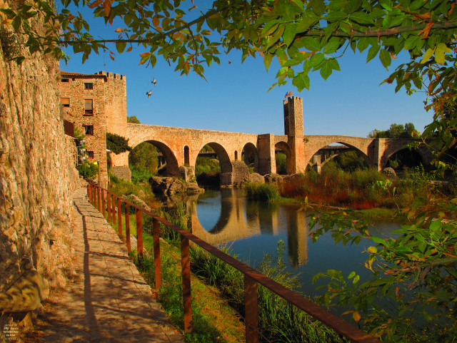 Bridge river stonebuilding woodenfence autumn free wallpaper - medium preview image