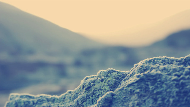 Rock mountain blurry sky tiltshift free wallpaper - medium preview image
