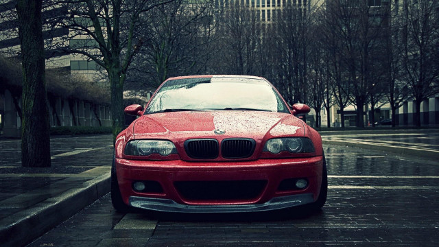 Red car wet street tree free wallpaper - medium preview image